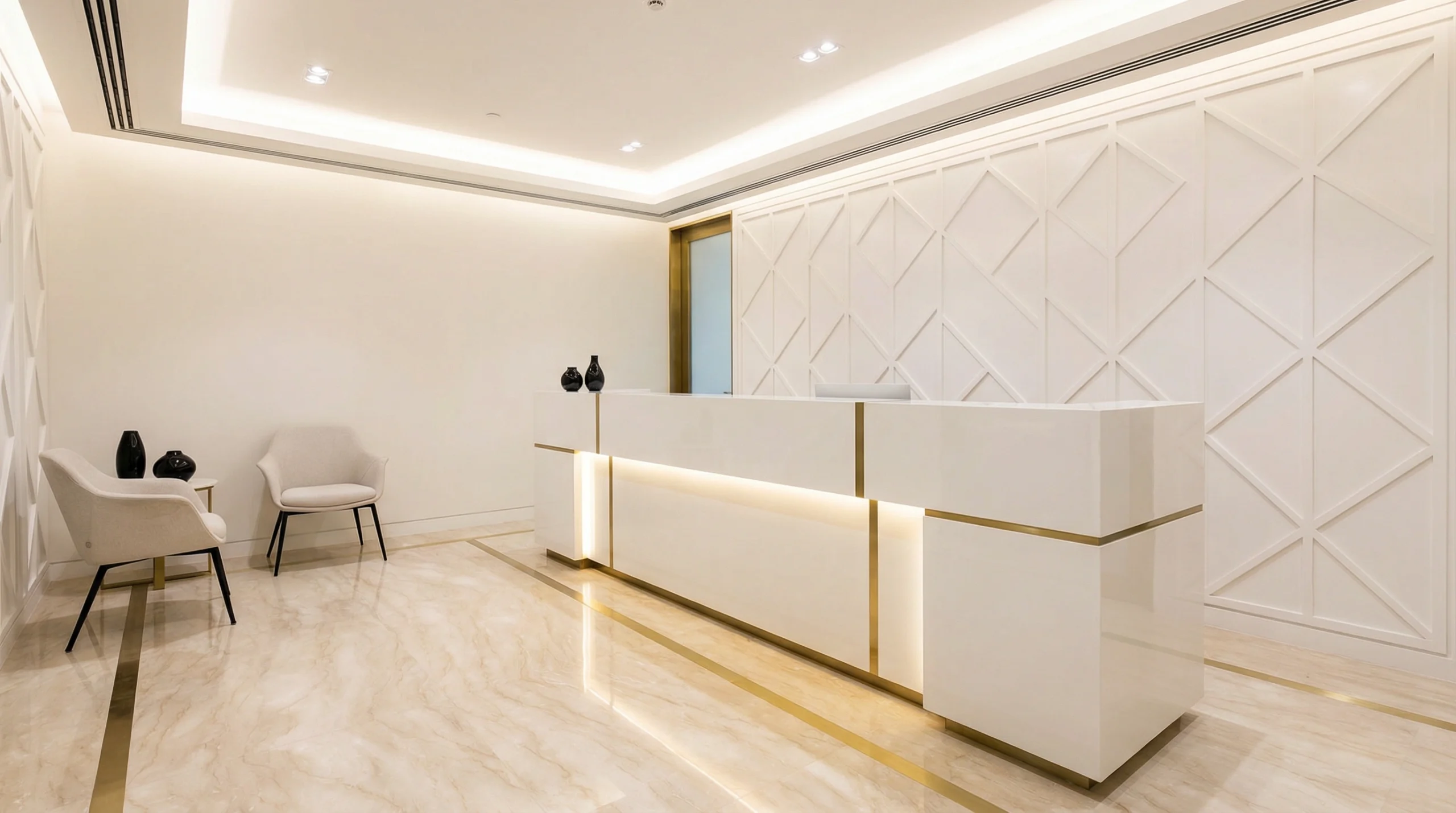 Bespoke custom reception desk Dubai — white lacquer and brass office reception by Karnak Carpentry