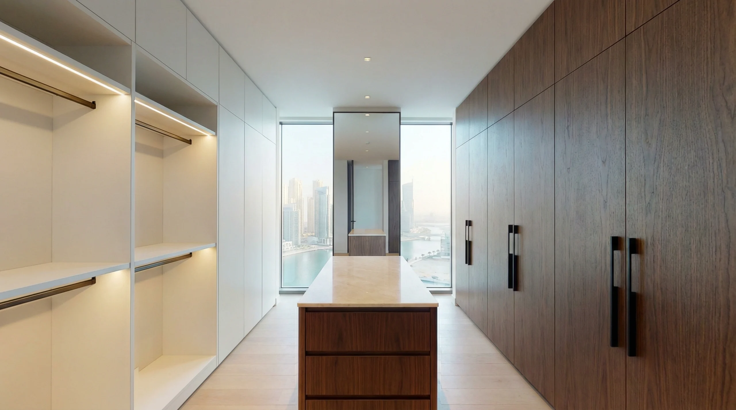 His and hers walk-in closet in Dubai Marina penthouse — custom dual wardrobe design by Karnak Carpentry