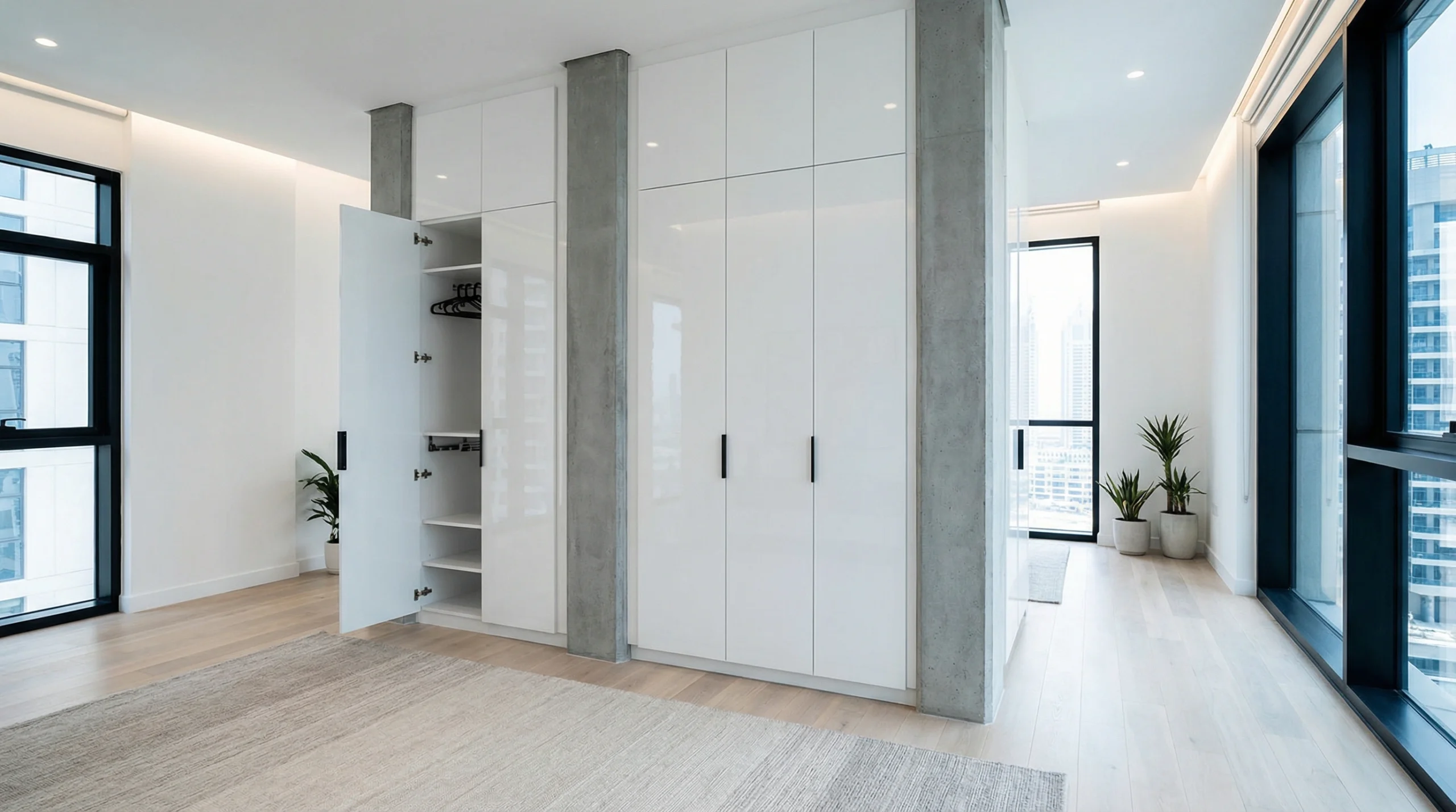 Custom fitted wardrobe Business Bay Dubai apartment — maximised storage design by Karnak Carpentry