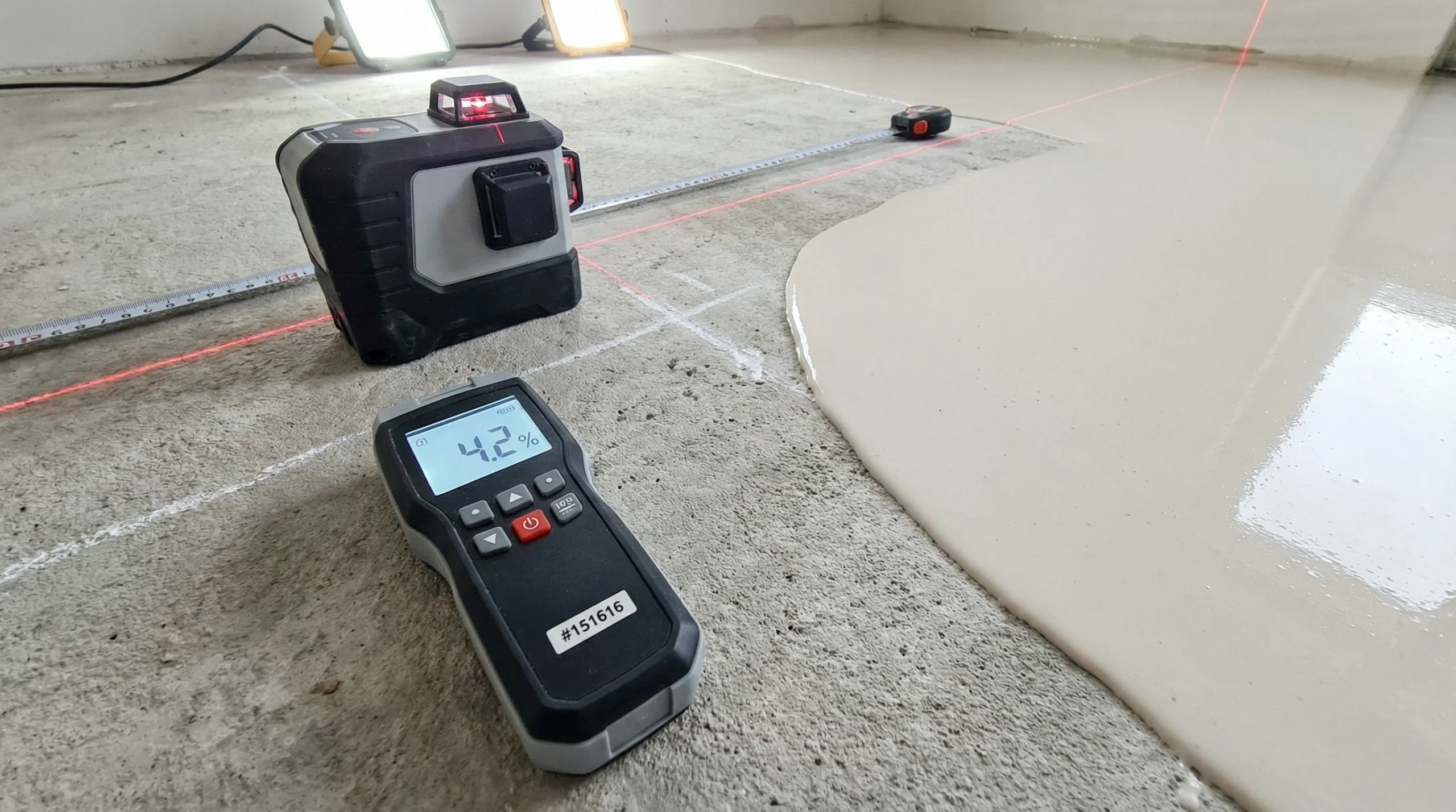 Technical flooring preparation showing moisture testing and leveling expertise Dubai