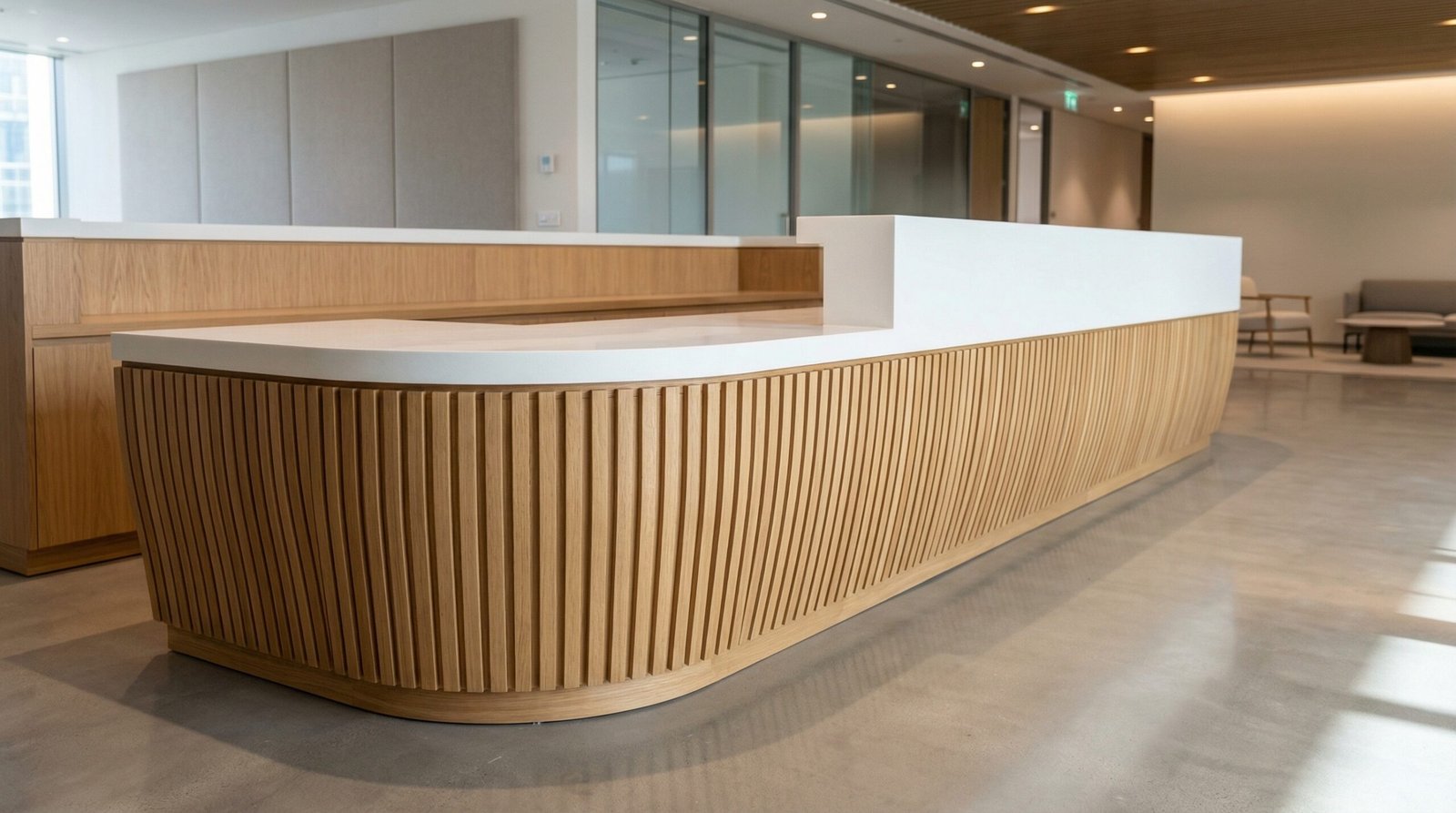 Massive Custom Built Curved Slatted Oak Wooden Reception Desk Inside A Business Bay Commercial Fit Out.