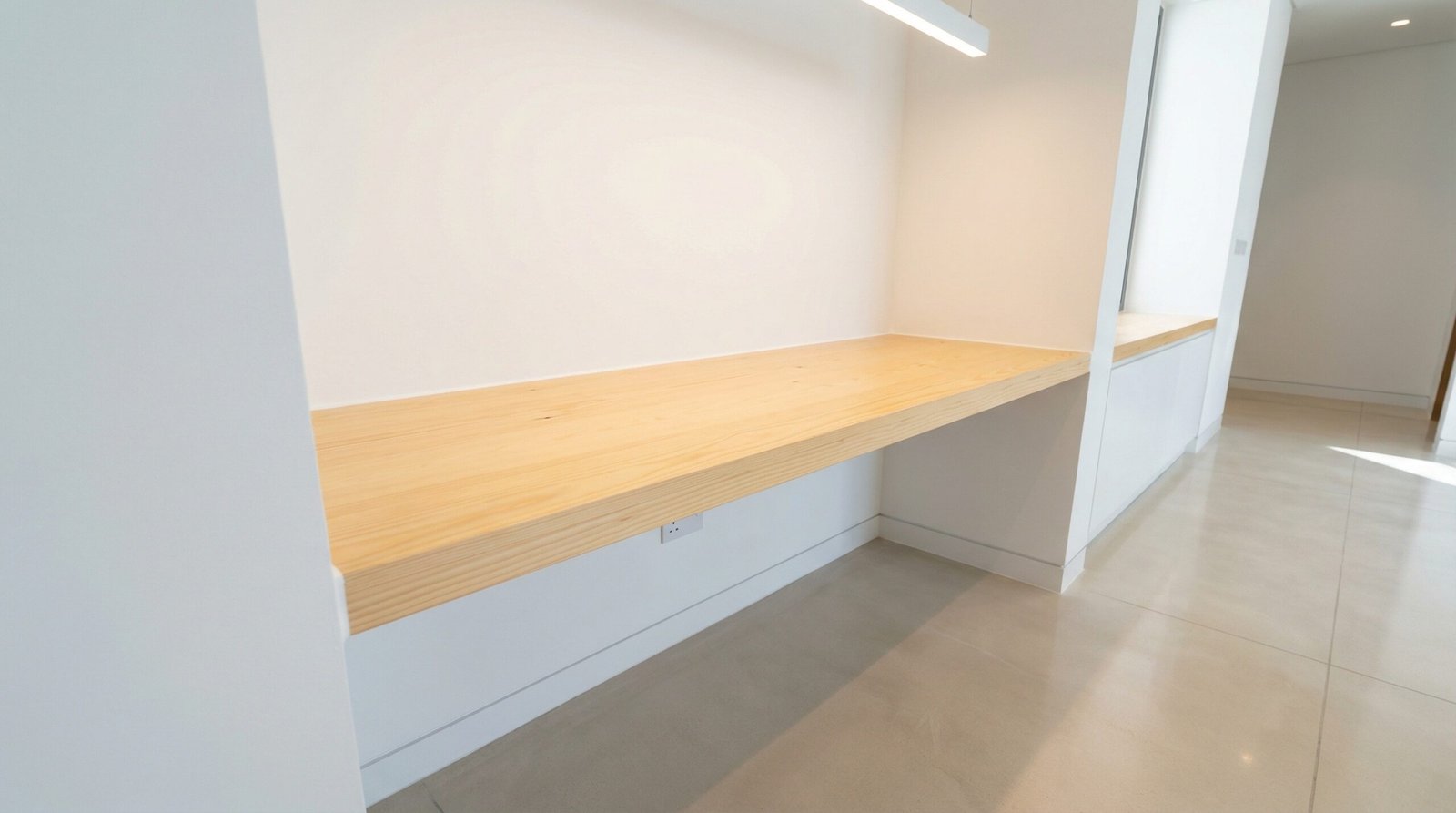 Flawlessly Installed Custom Built Wooden Desk With Pristine Clean Floors In A Modern Uae Home.