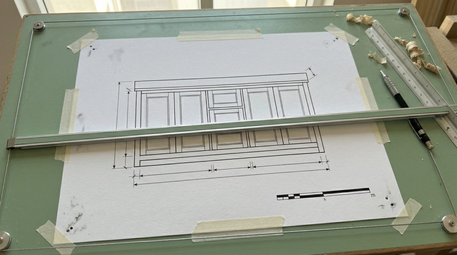 Technical front elevation drawing of 1500mm double bathroom vanity cabinet on drafting board in UAE joinery workshop