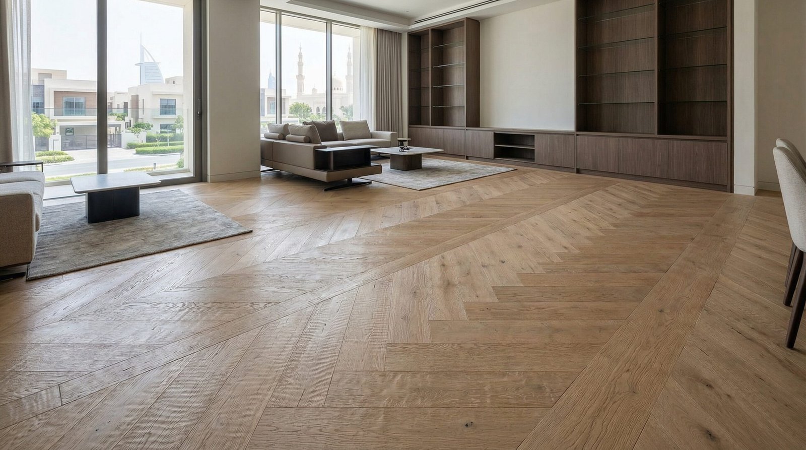 Consistent custom rough-sawn matte oak parquet in a modern Al Barsha home.