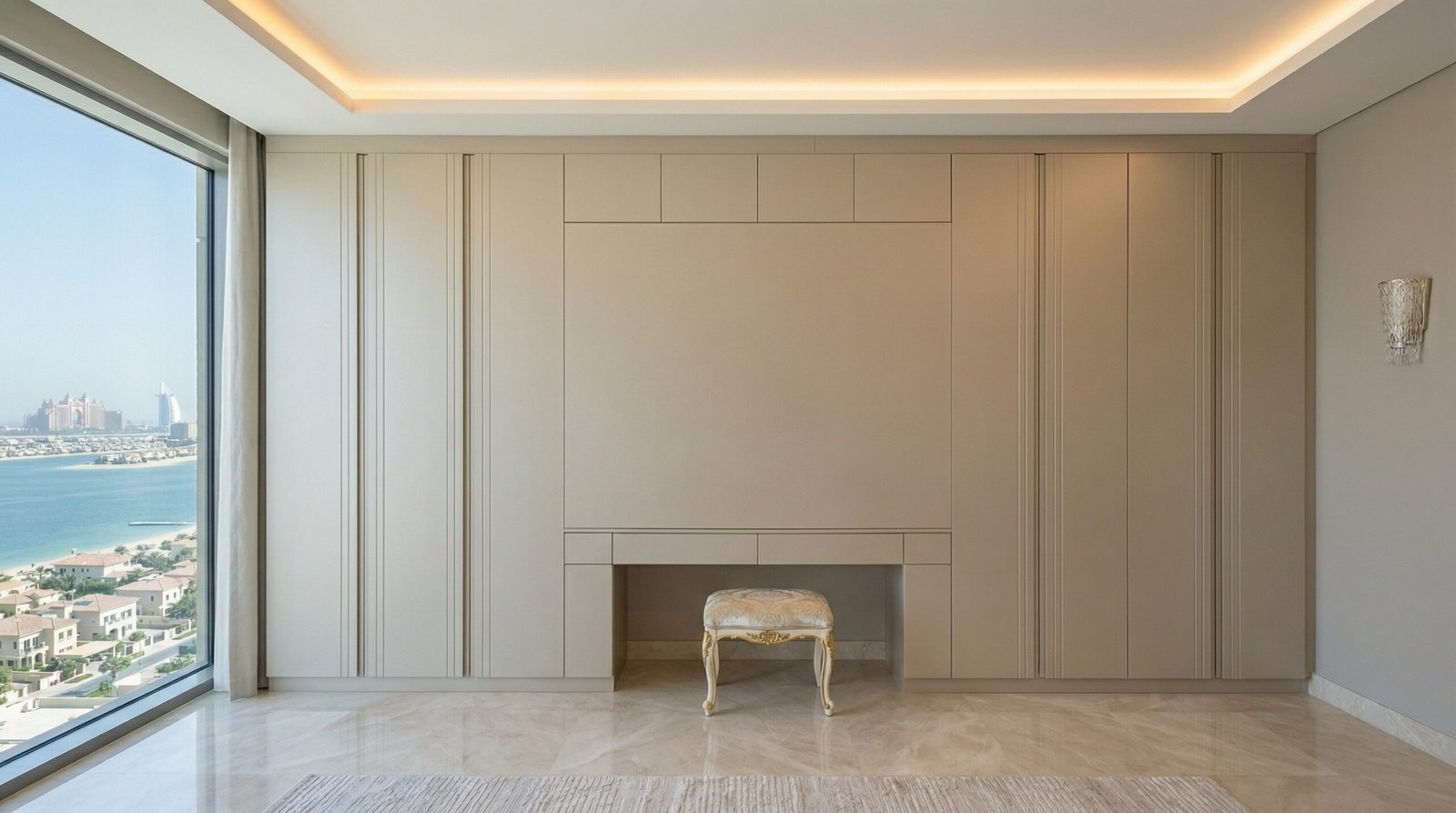 Integrated wardrobe dressing section in champagne lacquer with backlit triptych mirror and perfume niches in Palm Jumeirah apartment by Karnak Carpentry Dubai UAE