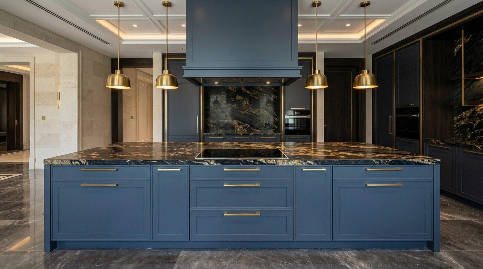 Slate blue kitchen island with integrated range hood and Portoro marble countertop in UAE luxury villa