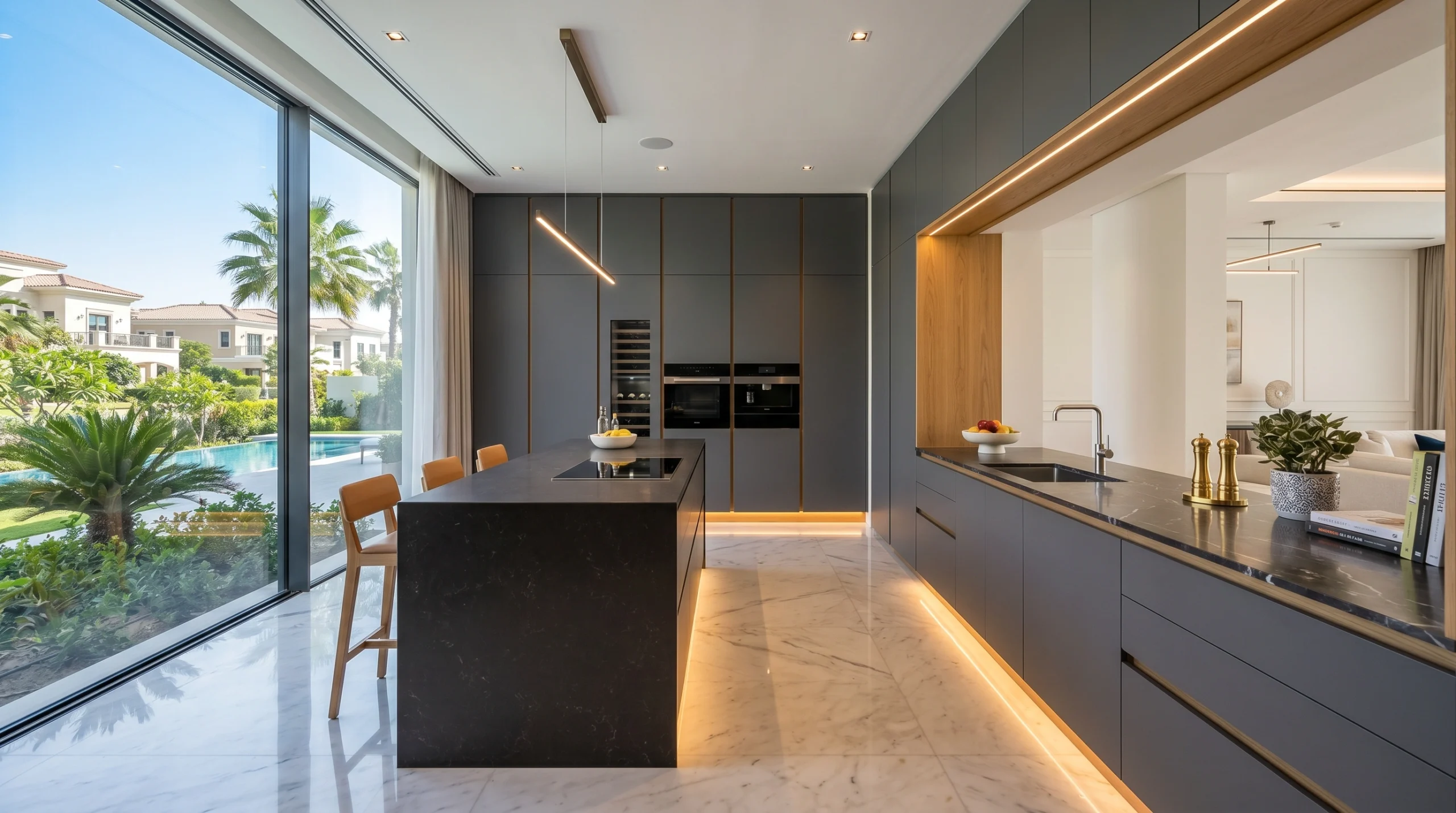 Modern floor-to-ceiling handleless kitchen cabinetry in matte charcoal and oak, custom-built for an Emirates Hills villa in Dubai.