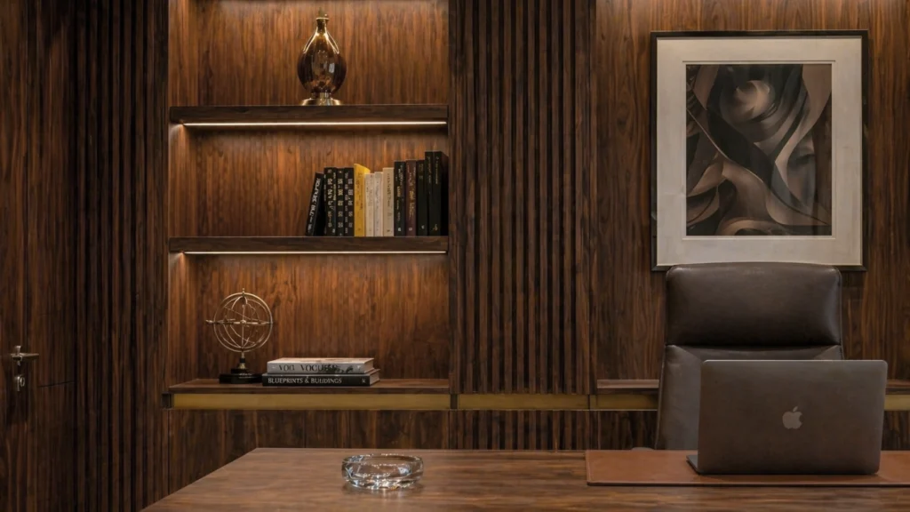 DIFC corporate office project Dubai — close-up of fluted walnut wall panelling and integrated shelving by Karnak Carpentry